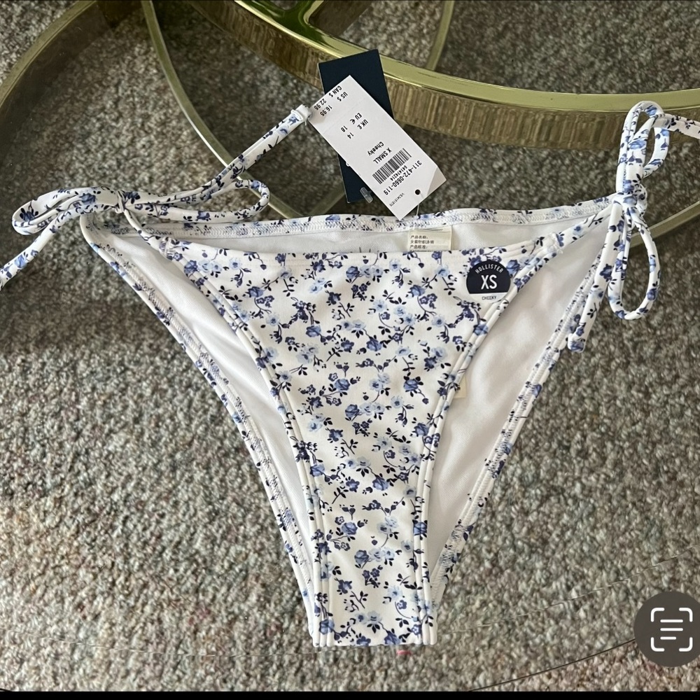 Womens/Juniors blue and white floral tie bikini bottom